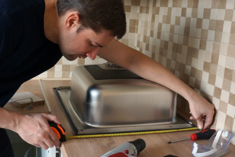 how to remove a garbage disposal from a kitchen sink